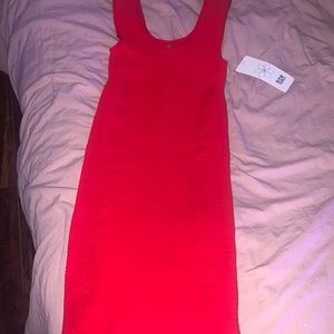 Size red tight red mini dress. Dress is a tight fit stretch nylon.